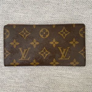 Authentic Louis Vuitton checkbook cover. Never been used.